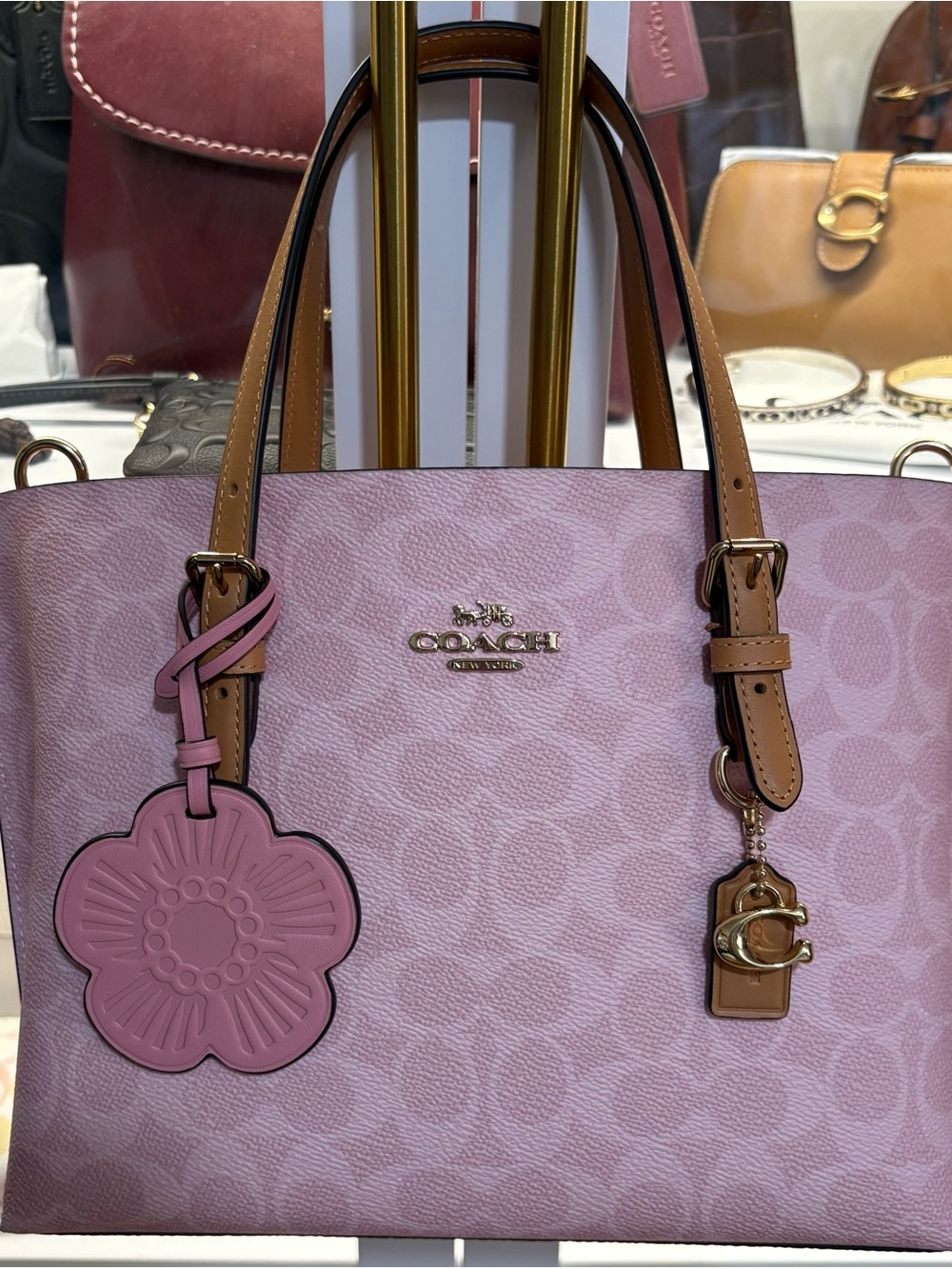COACH Pink Signature Satchel with Flower Charm